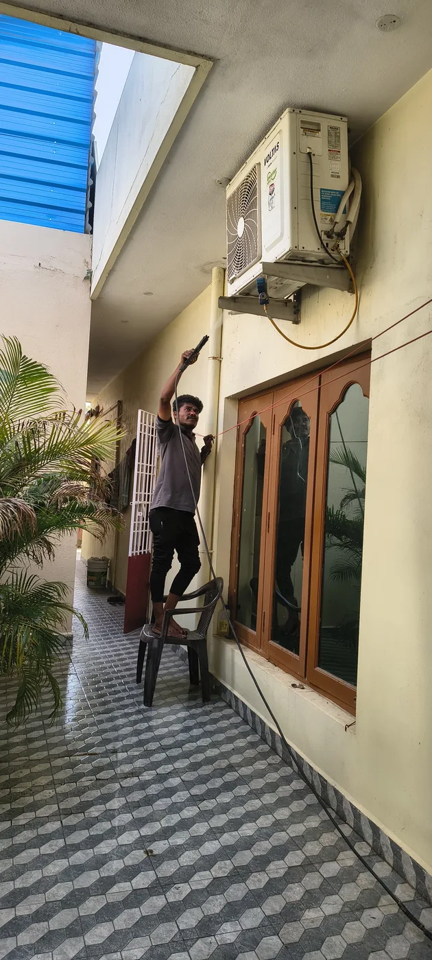 Outdoor AC unit servicing